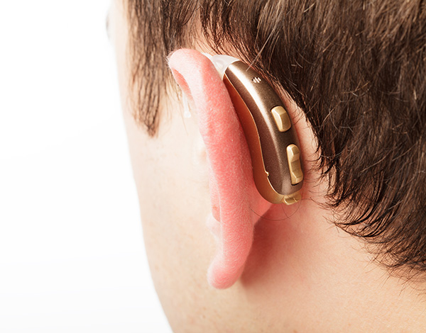 BTE hearing aid worn behind the ear